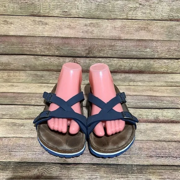Birki’s Blue Leather Crisscross Sandals