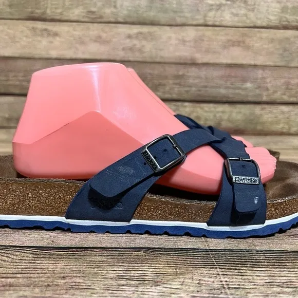 Birki’s Blue Leather Crisscross Sandals