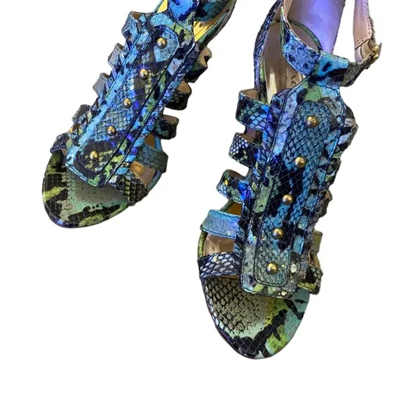 Coach Jenkins Q419 ankle strap snakeskin sandals.