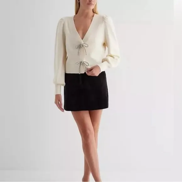 Express -viral ✨Holidays✨ivory embellished rhinestone bow front sweater cardigan