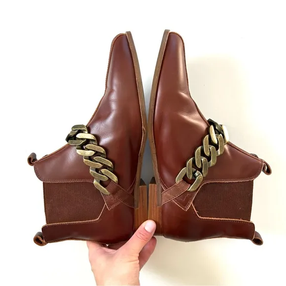 Kelsi Dagger Brown Cognac Genuine Leather Slow Chain Ankle Booties