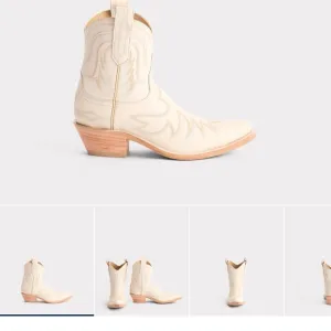 Lucchese Cream Heeled Boots with Western Stitching