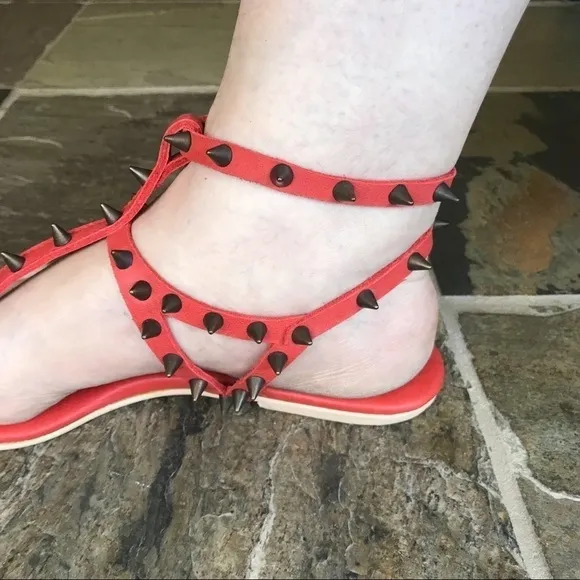 Marian Saud cherry red leather and metal studded ankle-strap gladiator sandals