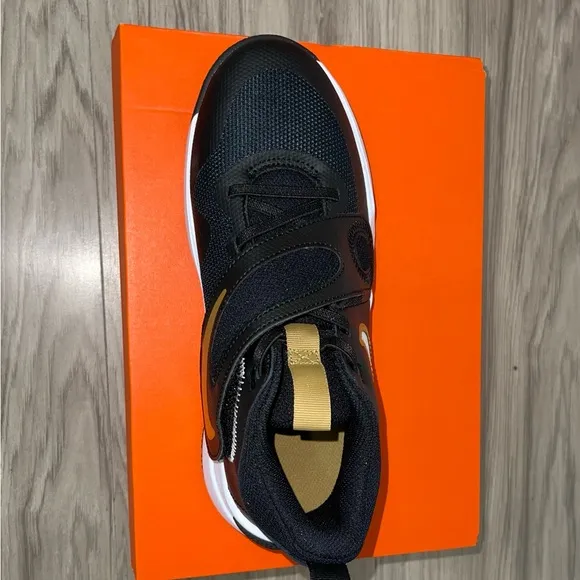Nike Kids Black and Gold Sneakers