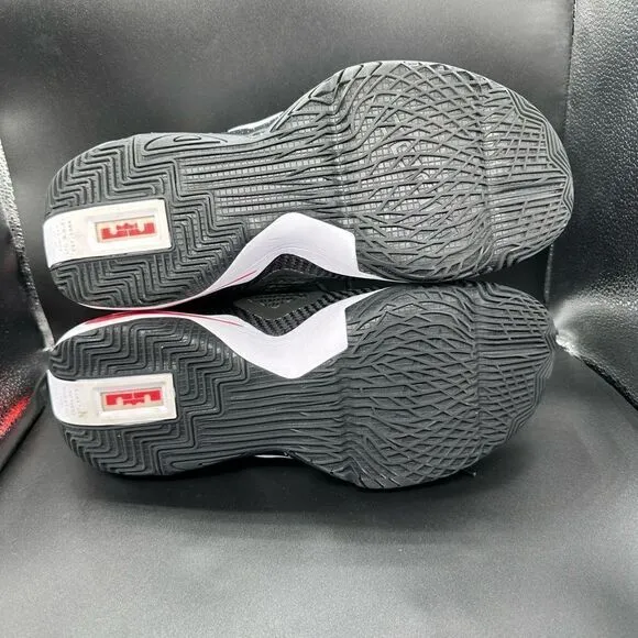 NWOT Nike Lebron soldier 14s black and white with red lace tab.