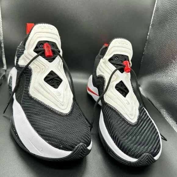 NWOT Nike Lebron soldier 14s black and white with red lace tab.