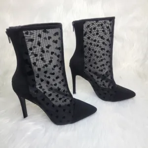 Pointed toe black mesh stiletto heeled ankle boots.