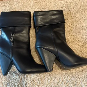Saint Laurent Black Heeled Boots with Fold-Over Cuff