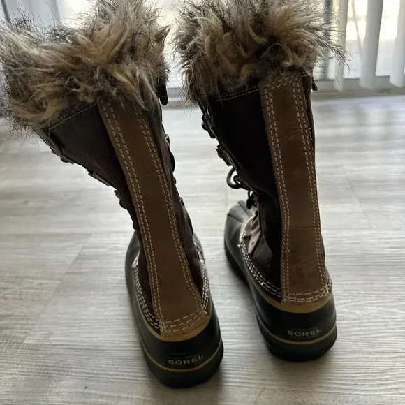 Sorel boots size 7 very roomy waterproof army green suede with faux fur.
