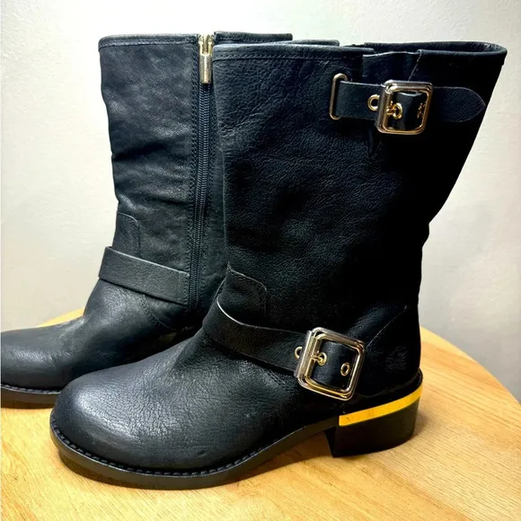 Vince Camuto black boots with gold accents