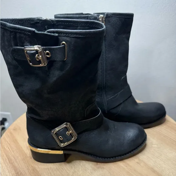 Vince Camuto black boots with gold accents