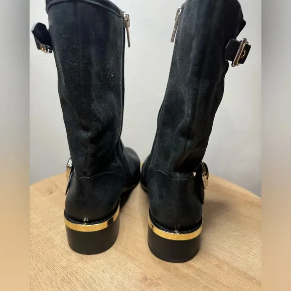 Vince Camuto black boots with gold accents